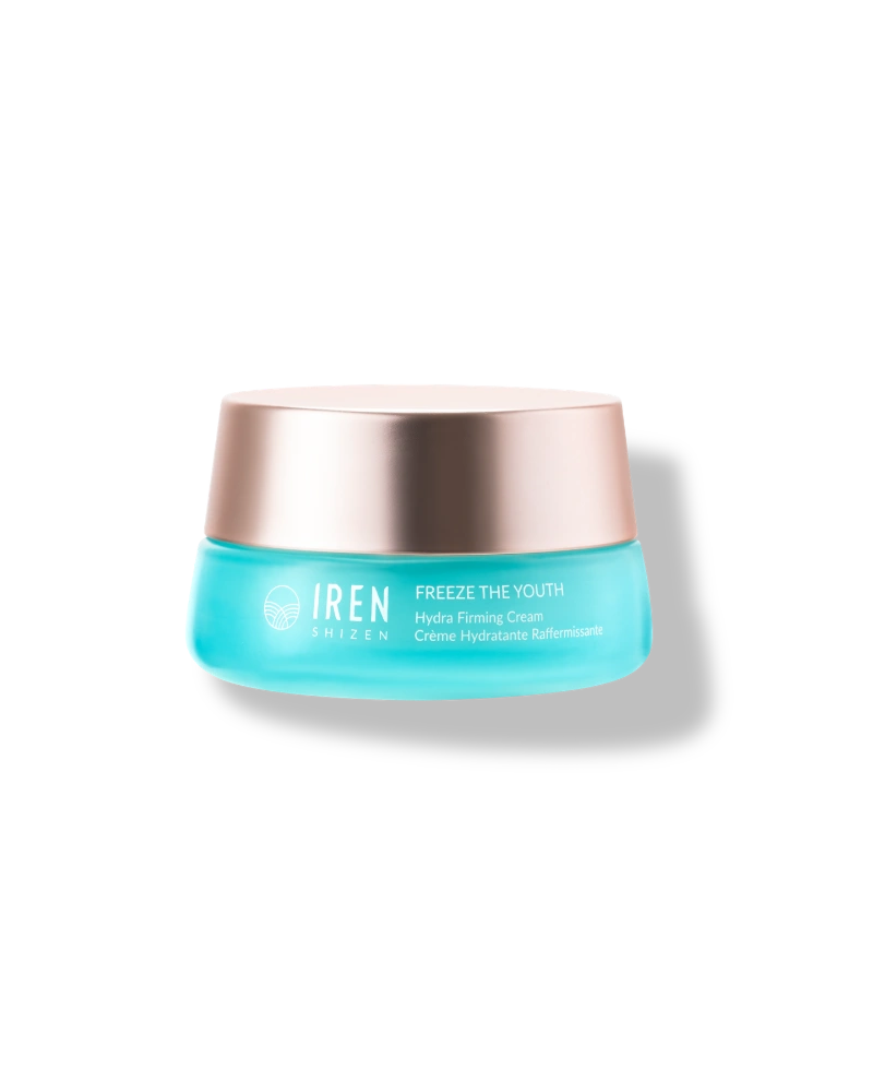 A blue jar of IREN Shizen FREEZE THE YOUTH Hydra Firming Cream with a rose gold lid is displayed on a plain white background.