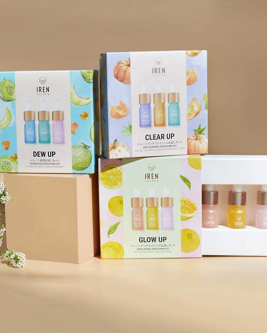 Three boxes with customised DEW UP Hydrating Discovery Kits by IREN Shizen, featuring Japanese skincare.