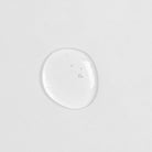 A small drop of Japanese skincare, IREN Shizen GLOW-GETTER Renewal Serum, on a white surface. #all-groups