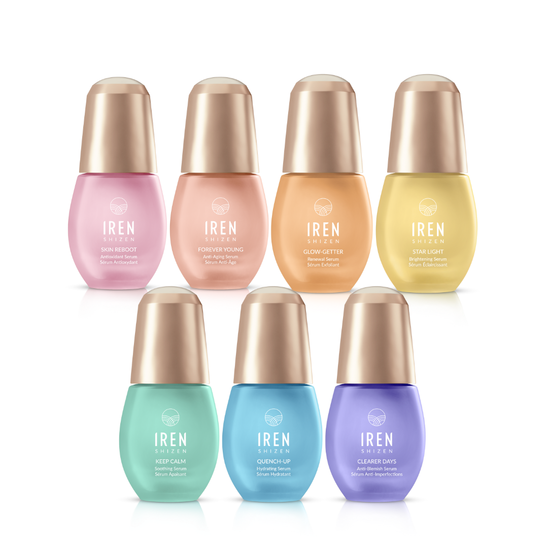 A set of six custom Japanese skincare IREN Shizen SAMPLE Serums bottles.