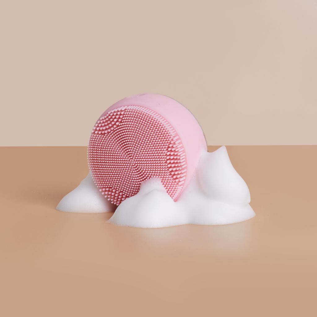 A SKIN GENIE PRO Cleansing Brush + LED Light Therapy on top of an IREN Shizen surface, providing customized Japanese skincare.