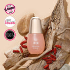 A bottle of IREN Shizen FOREVER YOUNG Anti-Aging Serum rests on driftwood with goji berries, framed by three award badges in the top left, emphasizing its anti-aging properties and collagen support. #all-groups