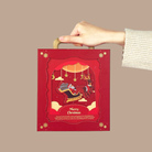 A hand holding an IREN Shizen FOR SPECIAL ONES Xmas Santa Claus Gift Box featuring a festive Santa and reindeer design along with "Merry Christmas" text.