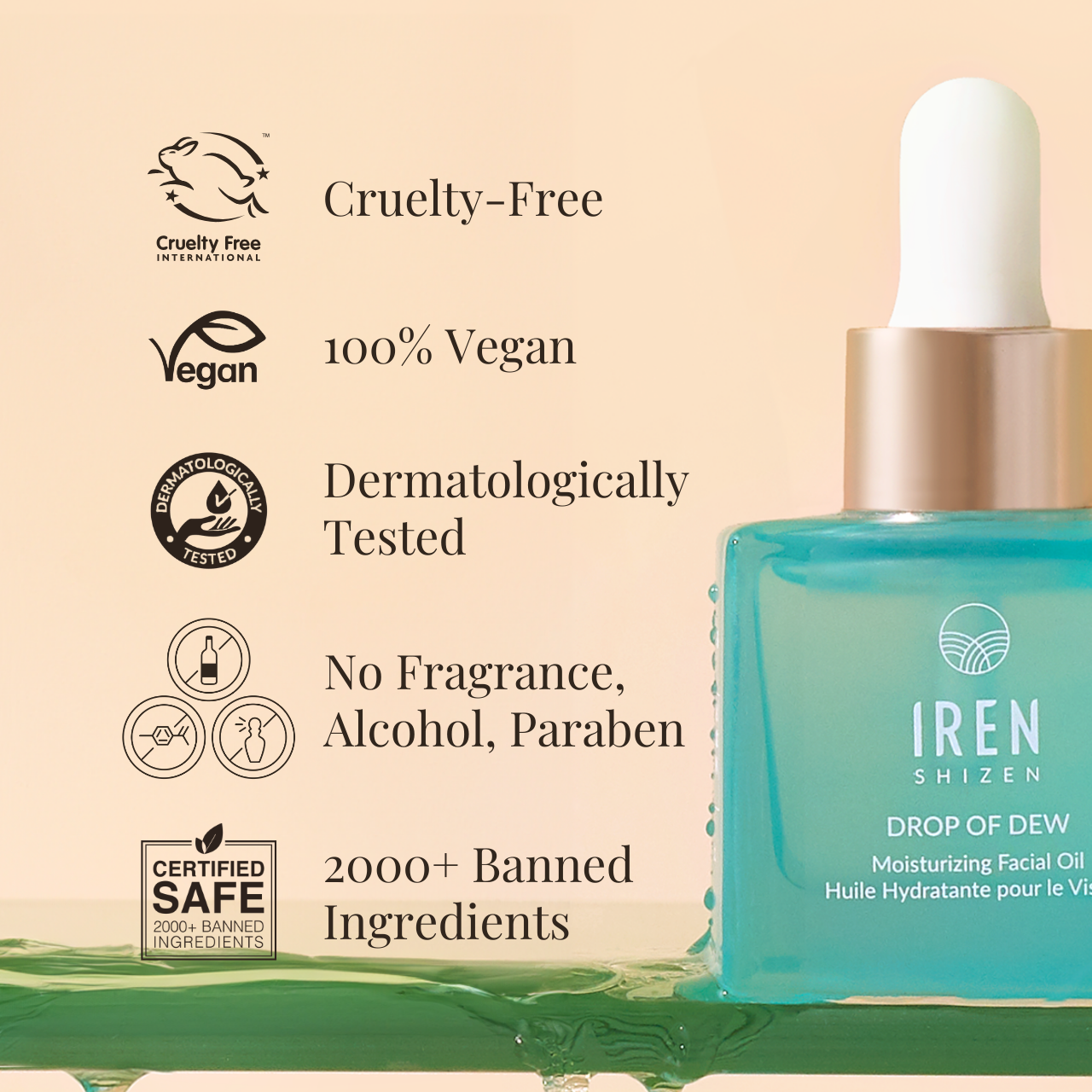 A close-up of the DROP OF DEW Moisturizing Facial Oil by IREN Shizen, featuring labels indicating cruelty-free, 100% vegan, dermatologically tested, free from fragrance, alcohol, and parabens, and comprising over 2000 banned ingredients—expertly formulated for hydration and perfect for sensitive skin. #all-groups #show-lang-en