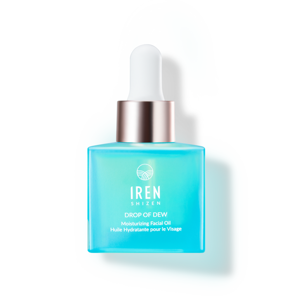 A bottle of IREN Shizen DROP OF DEW Moisturizing Facial Oil, featuring Japanese skincare, onsen skincare, on a black background.